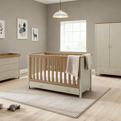 Light gray and natural wood finish babymore mira baby crib with base drawer in cashmere warm oak nursery set
