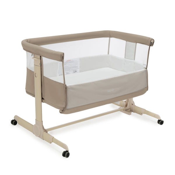 Babymore neera bedside crib khaki beige convertible bassinet with mesh sides padded fabric and metal frame on wheels