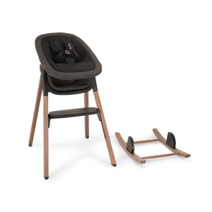 Modern wooden high chair with dark gray textured fabric seat and black safety harness in nuna bryn highchair bundle