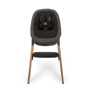 Modern Nuna Bryn highchair with textured charcoal gray fabric seat and wooden legs in Sanderson bundle