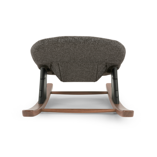Nuna BRYN highchair and newborn rocker bundle with gray textured fabric rocking chair, wooden rockers, and black metal supports