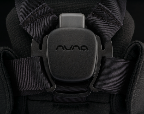 Black nuna bryn highchair harness buckle with textured fabric straps in sanderson newborn rocker bundle