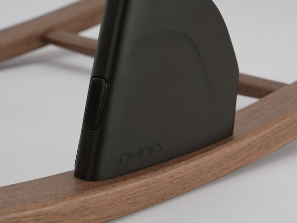 Black matte-finish ava a1 phone case with sleek minimalist design shown from the back in nuna bryn highchair bundle