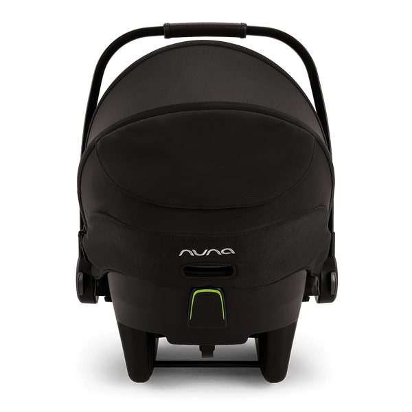 Black nuna pipa next infant carrier in caviar with sleek modern design and neon green accents for safe travel