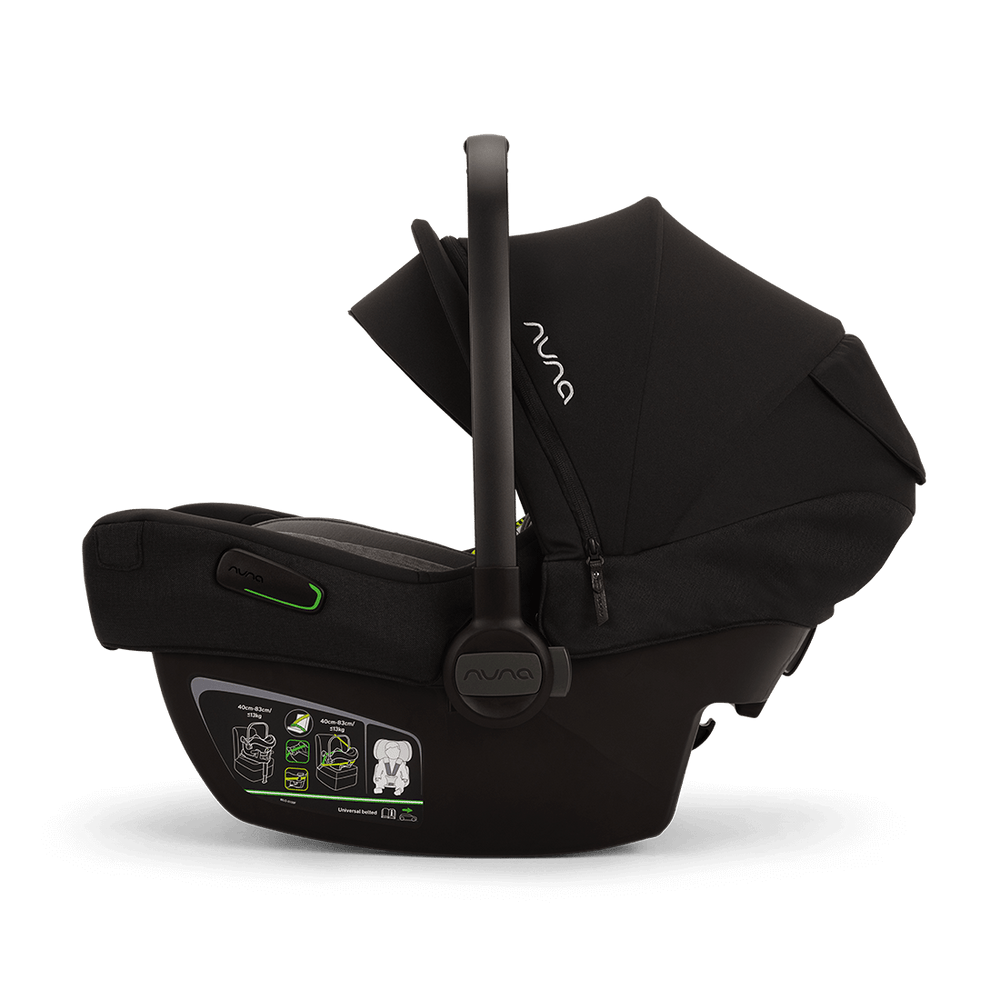 Black nuna pipa next infant carrier in caviar with sleek modern design and subtle green accent lighting