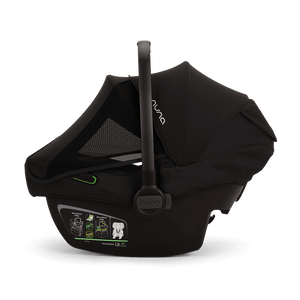 Black nuna pipa next infant carrier with mesh panel and green accent details for baby car safety and comfort