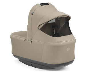 Beige peg perego city loop pro stroller bassinet with black base and mesh window for comfortable infant use