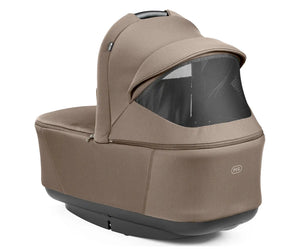 Beige fabric-covered baby carriage with black mesh window and base in peg perego city loop pro 3 in 1 elite travel system pine bark