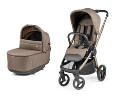 Beige and black peg perego city loop pro stroller with matching carrycot and sleek metallic frame pine bark color