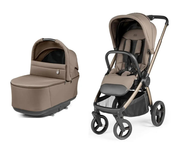 Beige and black peg perego city loop pro stroller with matching carrycot featuring sleek metallic frame pine bark color