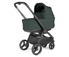 Dark green fabric-lined peg perego city loop pro stroller bassinet bundle with black metal frame and wheels