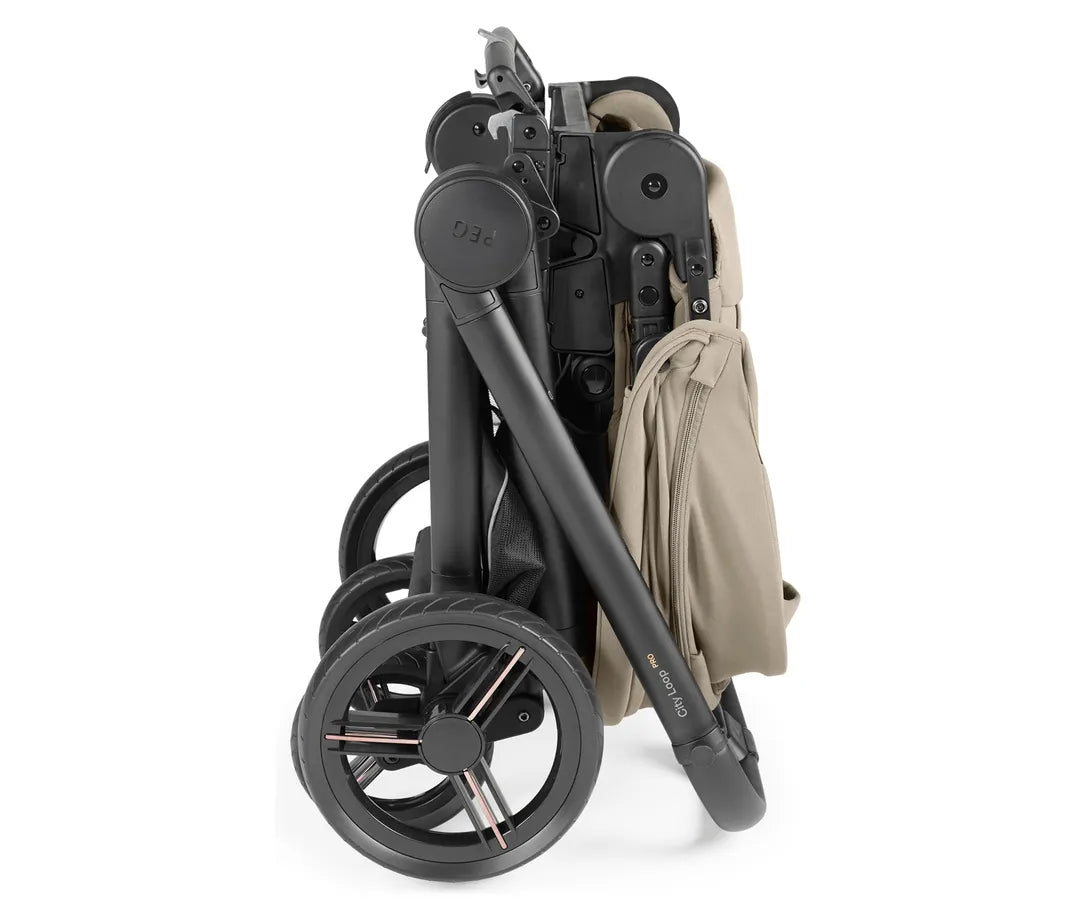 Black and beige peg perego city loop pro stroller with sleek modern design sturdy wheels and compact storage compartments
