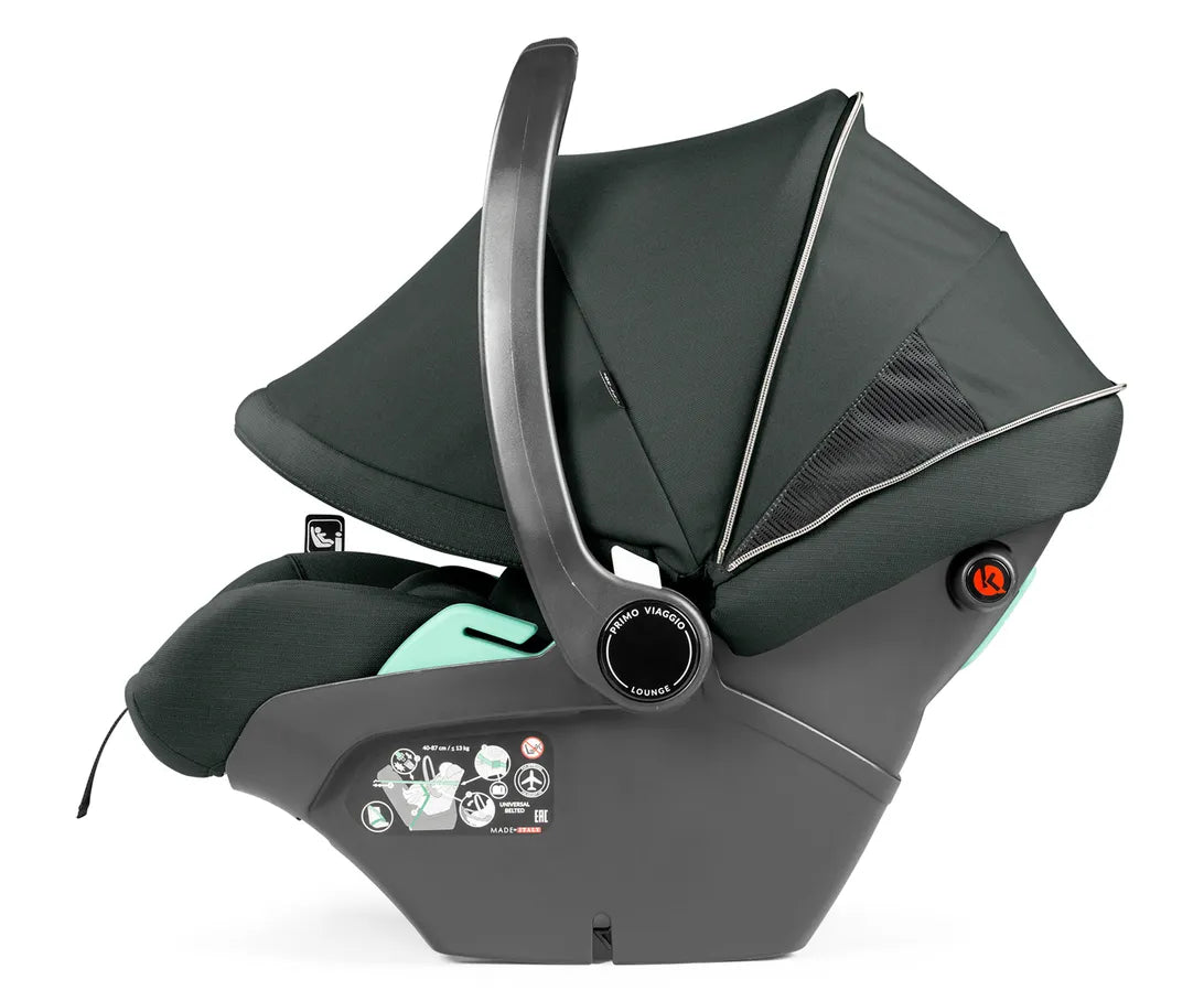 Dark gray Peg Perego City Loop Pro infant car seat with mint green padded interior and modern design in metal stroller bundle