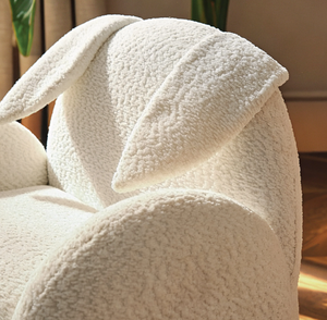 Etta bunny kids chair in boucle off white with white plush bunny shape soft textured fabric and floppy ears