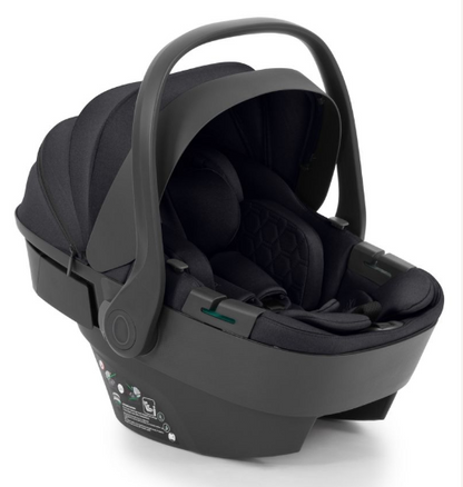 Black infant car seat with sleek modern design and soft fabric lining in egg3 carbonite all stages 360 bundle