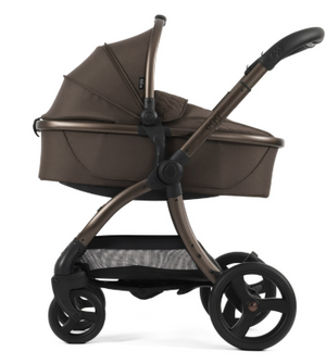 Egg3 chocolate velvet all stages 360 bundle pram with brown fabric, sleek metallic frame, and black wheels