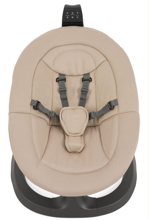 Beige oyster brand baby bouncer with gray harness straps and black base babystyle oyster ocean rocker buttermilk