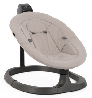 Beige upholstered baby swing with black plastic frame and control panel babystyle oyster ocean rocker stone