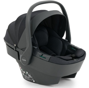 Black infant car seat with soft fabric lining and sleek modern design in oyster 4 carbonite essentials travel system