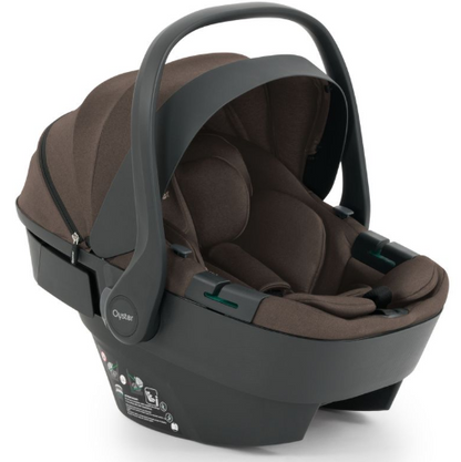Brown oyster infant car seat with sleek modern design soft fabric interior part of oyster 4 chocolate velvet travel system
