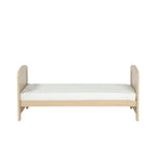 Bebe & Beyond Seeker Nordic Cot Bed converted into a toddler bed for growing children side view 
