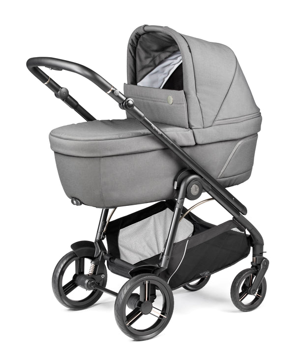 Gray fabric-lined baby carriage with black metal frame and wheels in peg perego veloce lite travel system 360 twist i-size bundle mercury