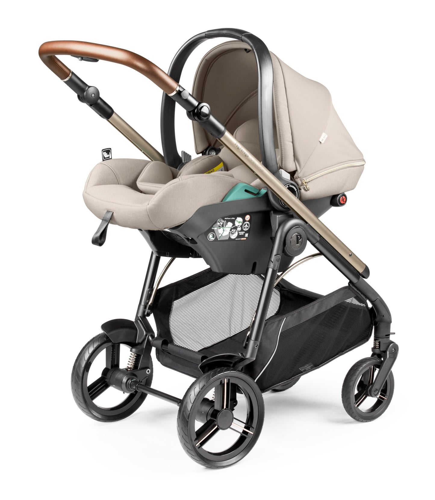Beige and black peg perego veloce lite travel system stroller with wooden handle metal frame and four wheels