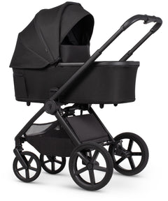 Venicci upline 3 travel system black baby stroller with sleek modern design and matte finish shown from the back side