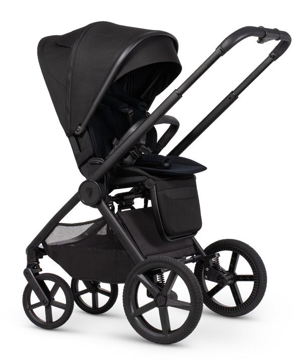 Black Venicci Upline 3 travel system stroller with sleek matte metal frame and modern design in onyx