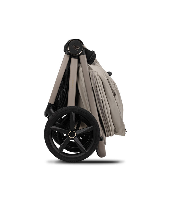 Beige and black venicci upline 3 pebble foldable stroller with sturdy frame and large wheels in ultimate 16 piece bundle