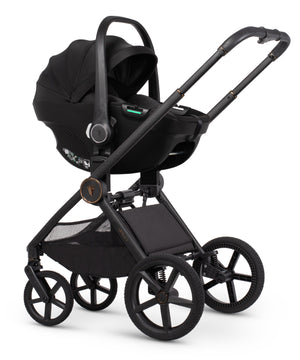 Venicci upline 3 travel system black infant car seat stroller with sleek metallic frame and matte black wheels