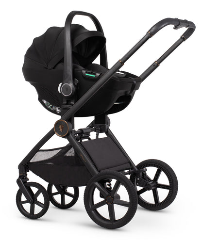Venicci upline 3 travel system black infant car seat stroller with sleek metallic frame and matte black wheels