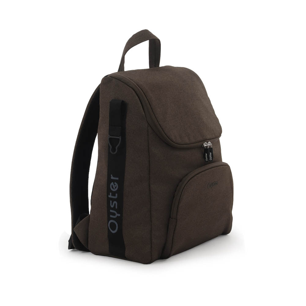 Brown oyster brand backpack with black accents and textured fabric finish in oyster 4 chocolate velvet luxury travel system