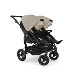 TFK Duo Twin & Sibling Sand Essential Twin Bundle – 2 Combi Units & Footmuffs | 2026 Combi Seat