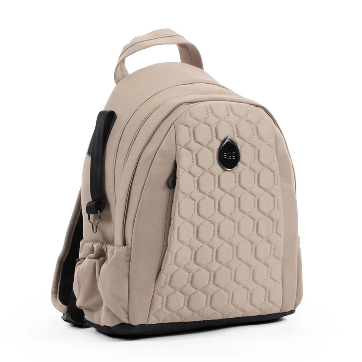 Beige quilted egg3 backpack with black accents and hexagonal pattern featuring egg logo in the all stages 360 bundle