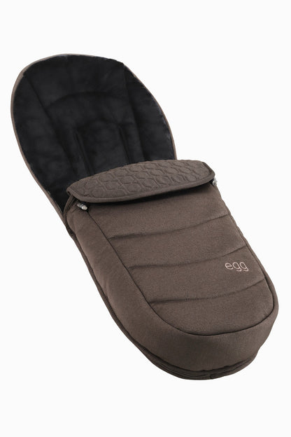 Brown quilted baby sleep sack with black plush interior and egg branding in egg3 chocolate velvet all stages 360 bundle