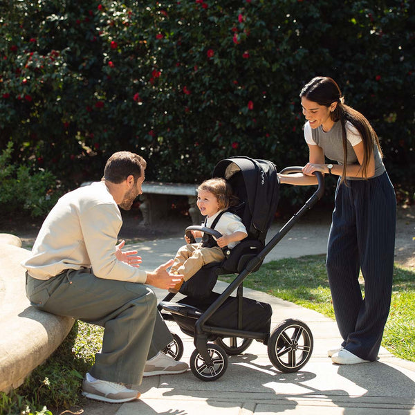 Nuna MIXX NEXT stroller in caviar black with a child seated inside showing a comfortable ride solution