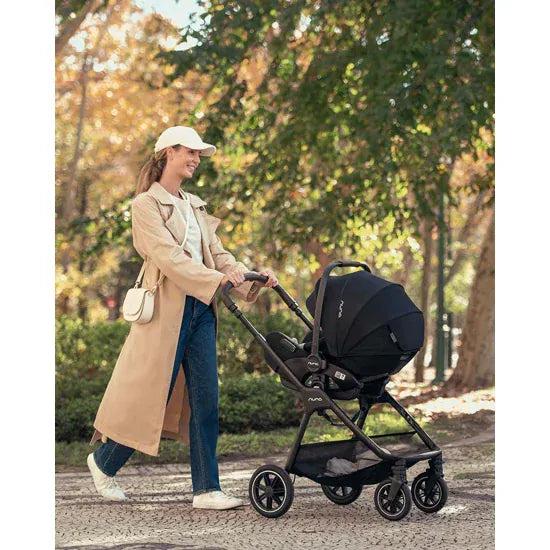 Black nuna stroller with a sleek, modern design and four wheels