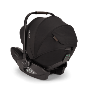 Black Nuna ARRA Flex car seat with sleek modern design and subtle teal accent lighting for flat recline i-Size use