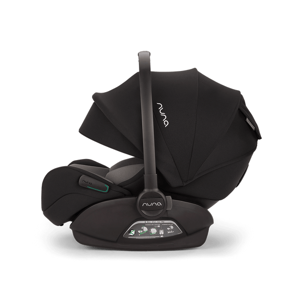Black Nuna ARRA Flex car seat with flat recline i-size design and subtle green accents for babies 0 to 13 kg