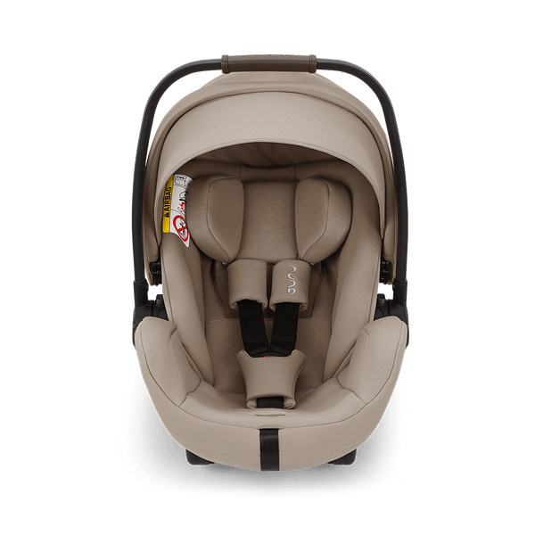 Beige Nuna ARRA Flex infant car seat with sleek modern design black accents flat recline i-Size baby seat 0-13kg