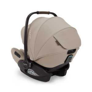 Beige nuna arra flex car seat with black frame and accents flat recline i-size seat for babies 0 to 13kg