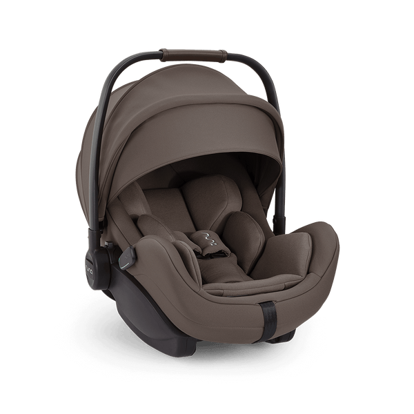 Brown fabric nuna arra flex car seat with black metal frame featuring sleek modern design and flat recline i size baby seat
