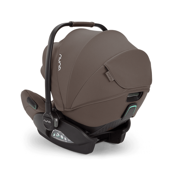 Brown nuna arra flex car seat chestnut with sleek modern design and black base for 0–13kg babies