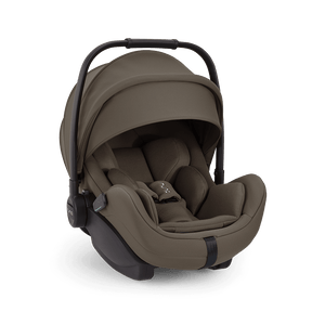 Brown infant car seat with sleek modern design and black frame in nuna arra flex pistachio flat recline i-size baby seat