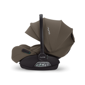 A sleek taupe nuna arra flex baby car seat with modern design and black base for flat recline i-size use