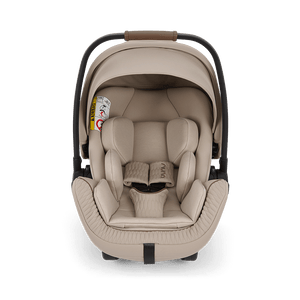 Beige nuna arra flex infant car seat with padded quilted upholstery and sleek black frame for babies up to 13kg