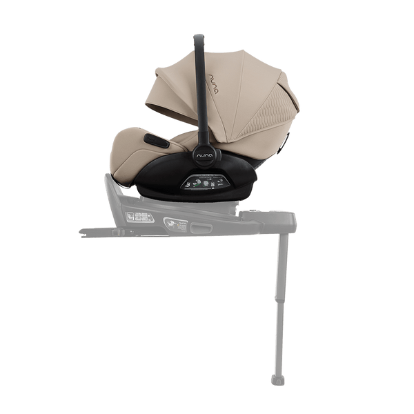 Beige and black nuna arra flex car seat with sleek modern design and flat recline i-size for up to 13kg babies
