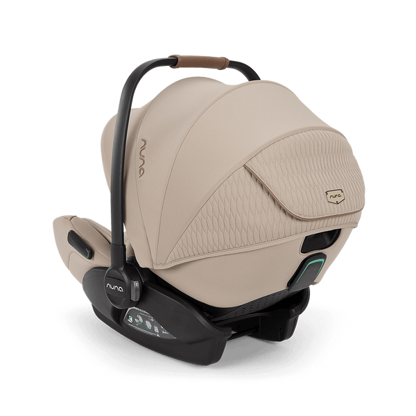 Beige nuna arra flex i-size baby car seat with quilted fabric and black frame for 0-13kg infants