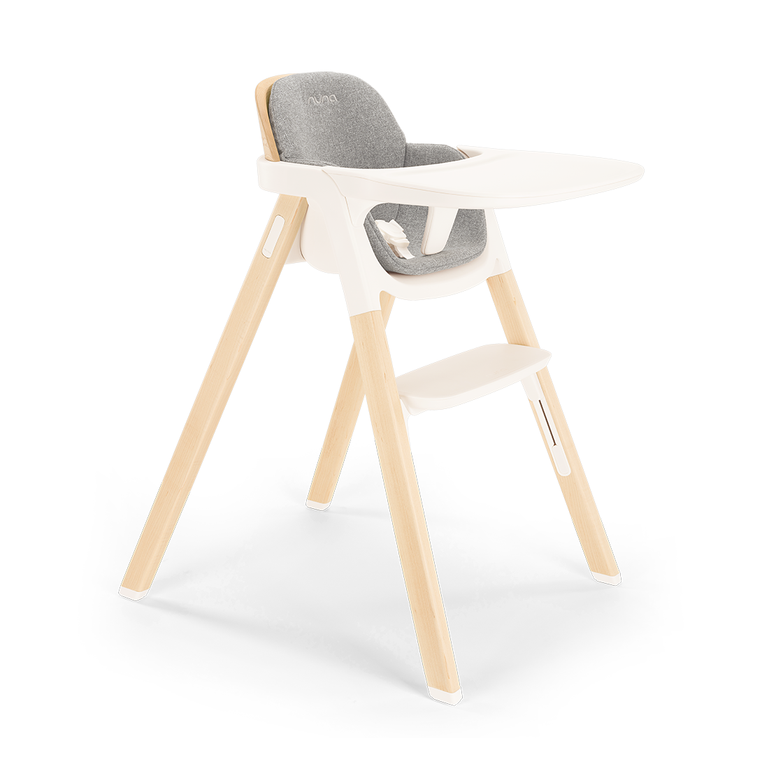 Modern Nuna BRYN highchair with light wood legs white plastic frame and gray upholstered seat for babies and toddlers